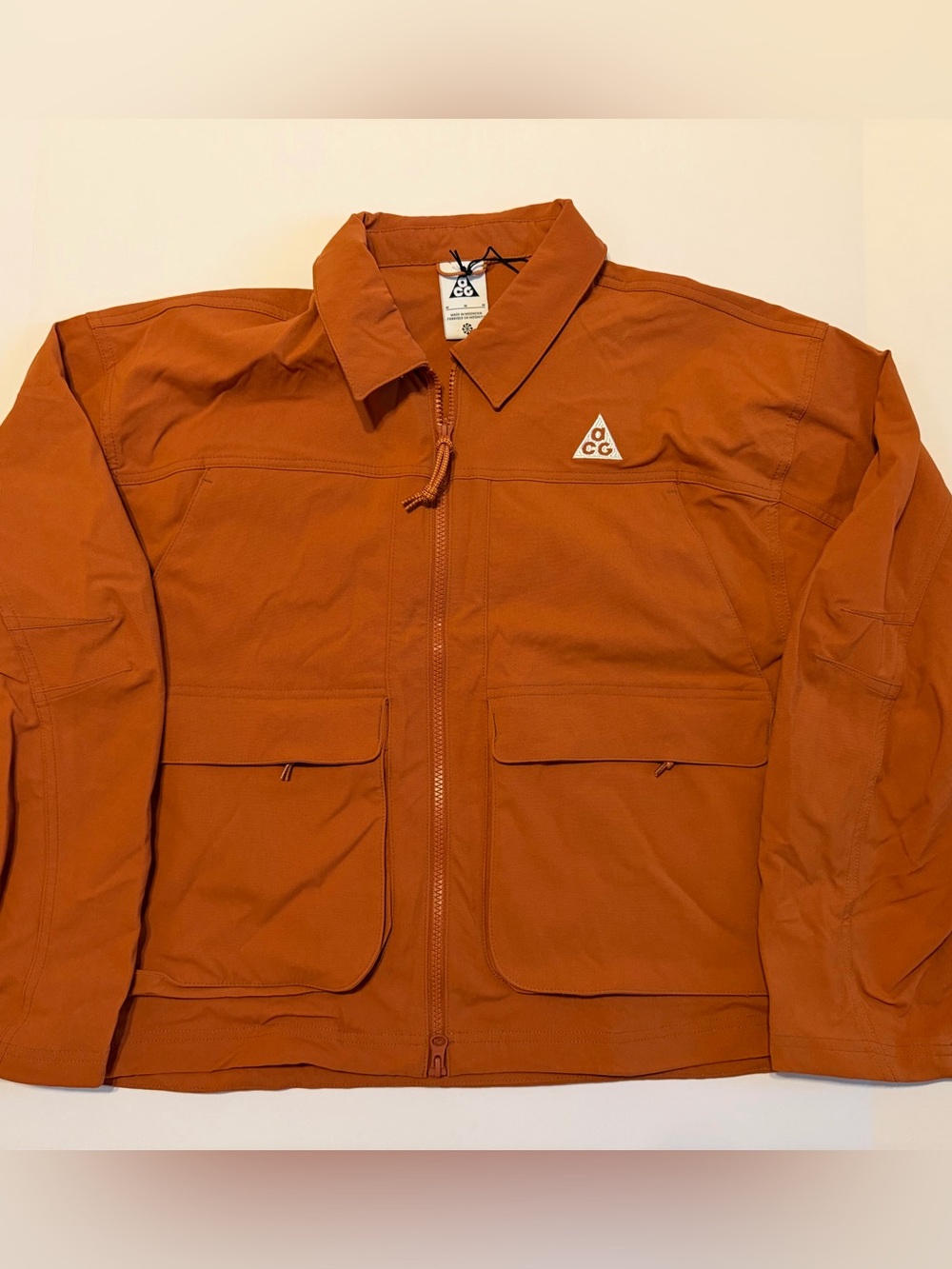 Nike ACG Women’s Rust Orange Lightweight Zip Jacket